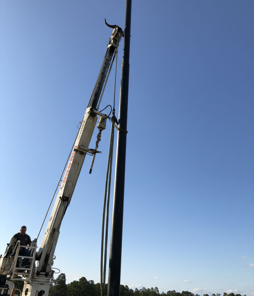 Custom golf course net installation at Pinehurst Golf Course, designed to enhance driving range safety.