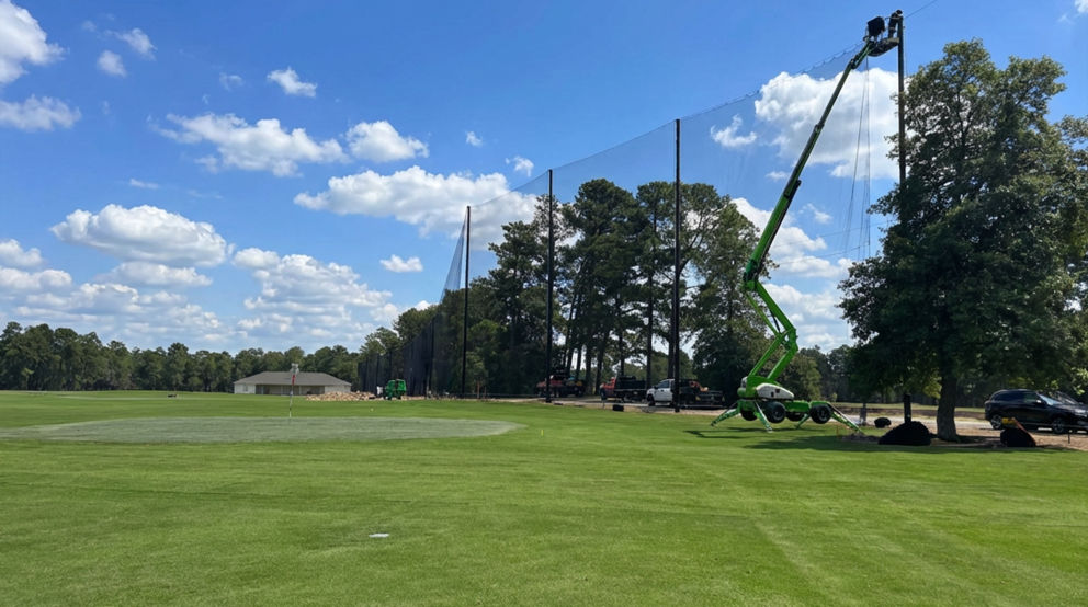 Custom golf course net installation at Pinehurst Golf Course, designed to enhance driving range safety.